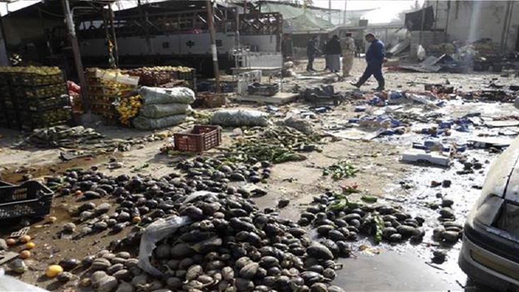 مقتل واصابة 13 شخصا بتفجير داخل سوق شعبية شمالي بغداد