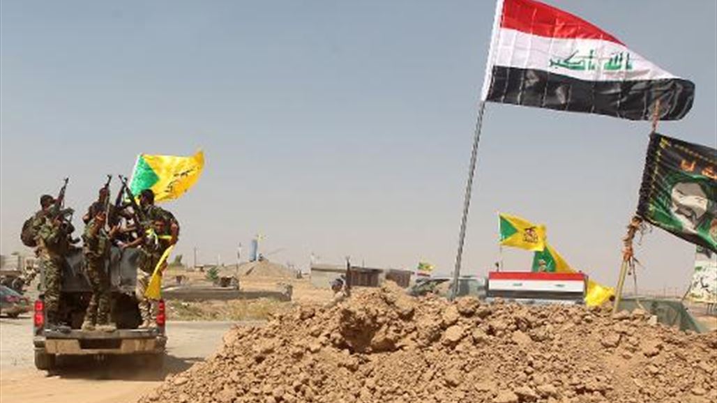 القوات الامنية تطهر منطقة بقضاء الدور وترفع العلم العراقي فوقها