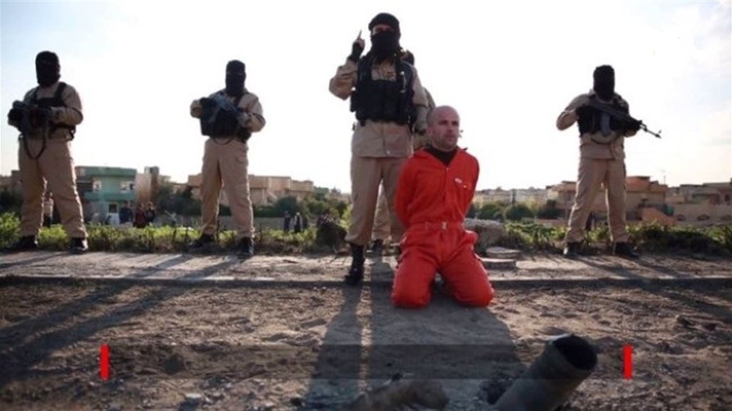 "داعش" ينحر شرطيا أمام جمع من الناس شمال تكريت