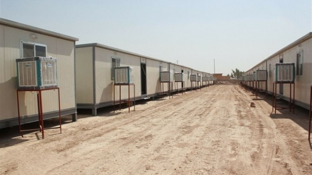 الهجرة: نقل عوائل نازحة من فنادق كربلاء لمخيم كرفانات