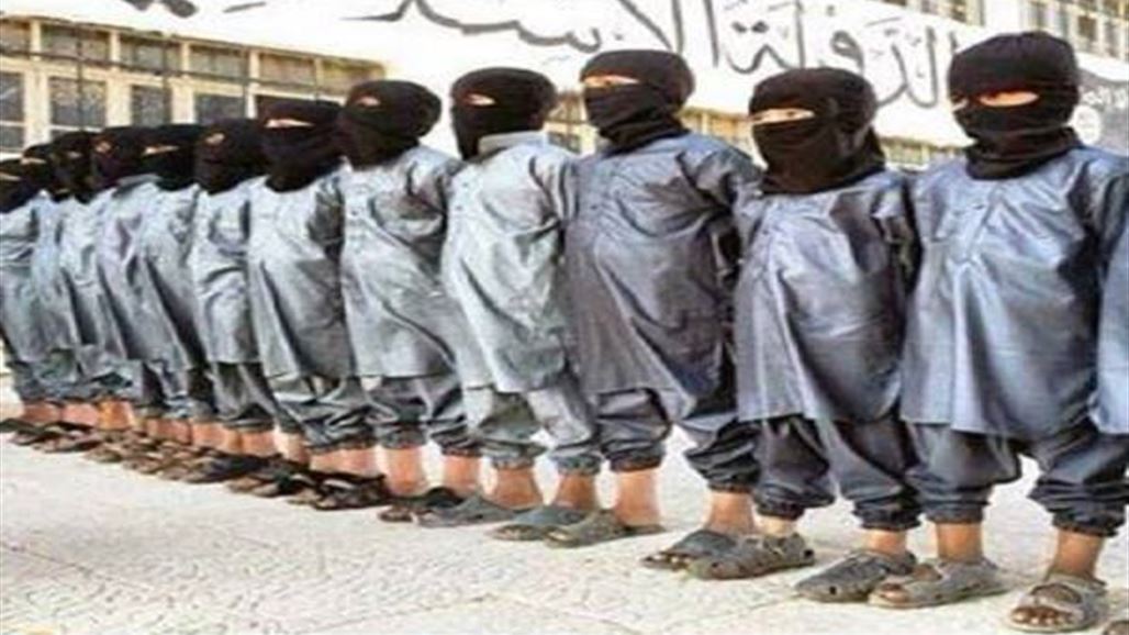 طفل "داعشي" بملامح اسيوية يعدم مدرسا مسنا شمال صلاح الدين