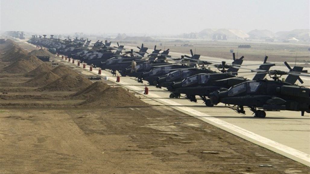 وصول طائرات اباتشي اميركية وتجهيزات عسكرية الى قاعدة الحبانية