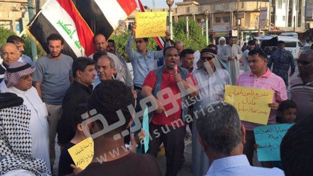 العشرات يتظاهرون في ذي قار والديوانية استنكاراً لتفجيرات بغداد