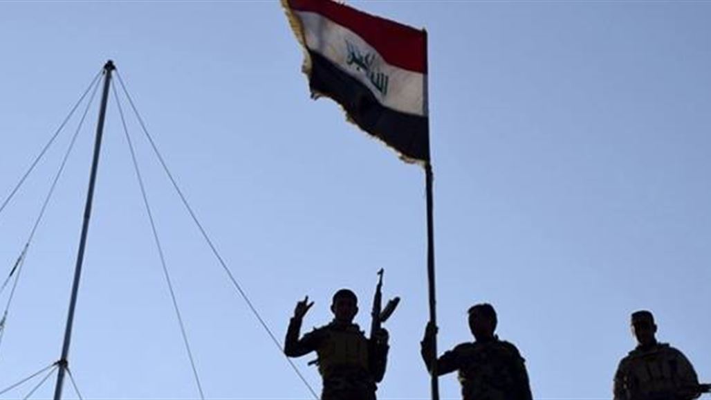 رفع العلم العراقي فوق المركز الصحي لحي الجولان شمالي الفلوجة