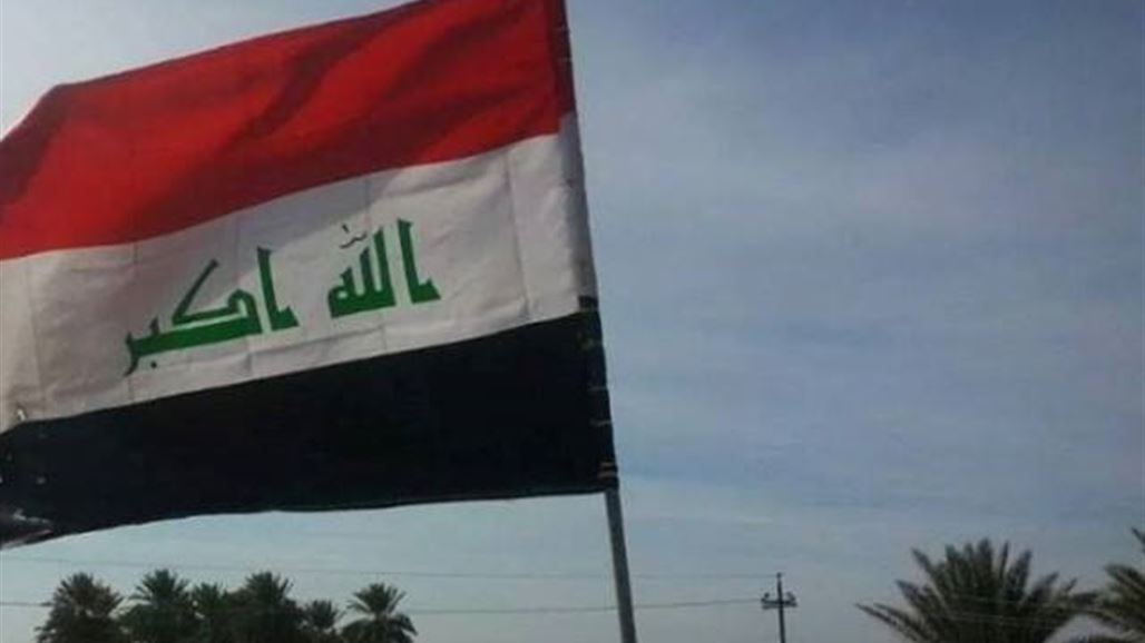 مجهولون يرفعون العلم العراقي وسط الموصل و"داعش" يستنفر عناصره