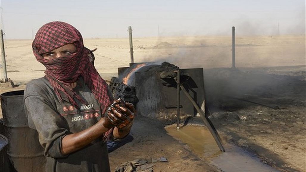 نواب عن نينوى: داعش احرق آبار النفط بالقيارة
