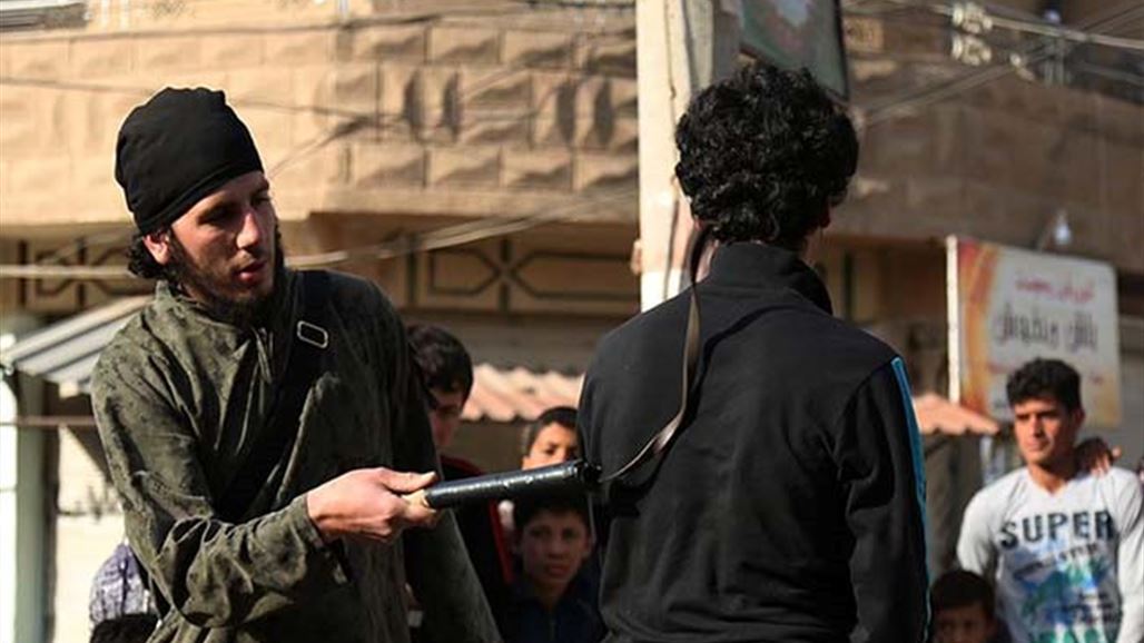 "داعش" يجلد 14 حلاقا في الموصل