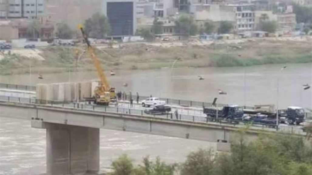 غلق جسر الجمهورية بالكتل الكونكريتية وانتشار امني وسط بغداد