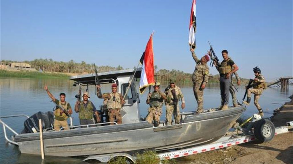 تحرير منطقة حي البكر في جزيرة هيت ورفع العلم العراقي فيها