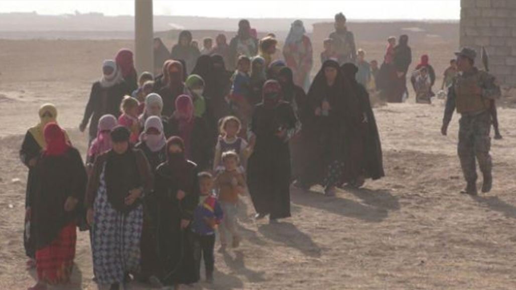 بالصور.. الشرطة الاتحادية تنتشل عشرات الأسر من حقبة "داعش" جنوب الموصل