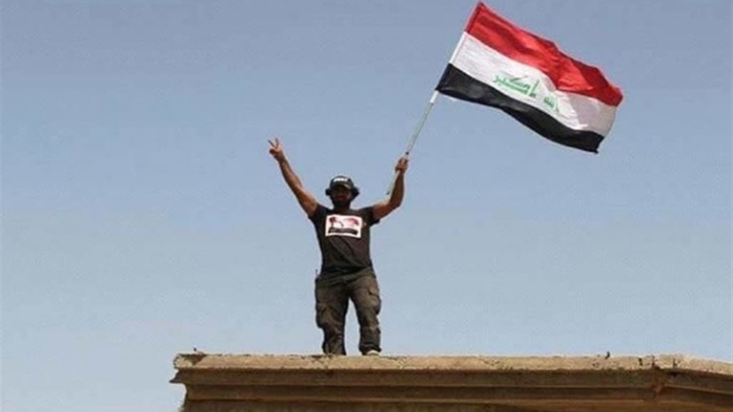 رفع العلم العراقي فوق اكبر قرى الساحل الايسر بناحية القيارة