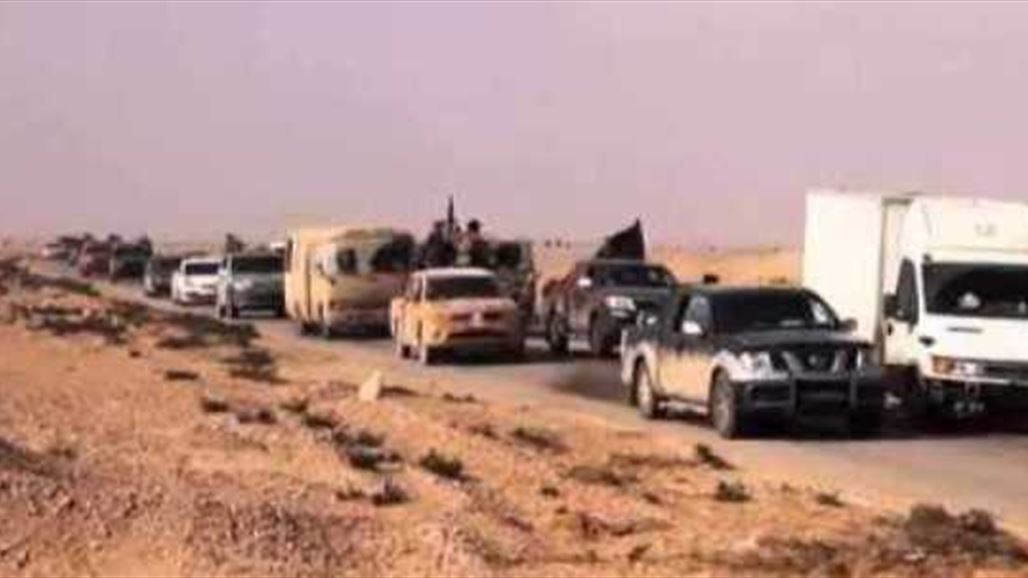 مسلحو "داعش" يجردون العوائل من مقتنياتها على ابواب الموصل
