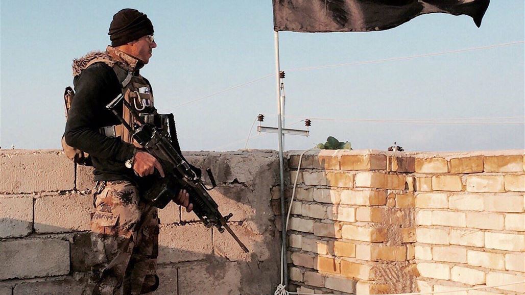 قوات مكافحة الارهاب تحرر حي الغفران بالموصل وترفع العلم العراقي فوقه