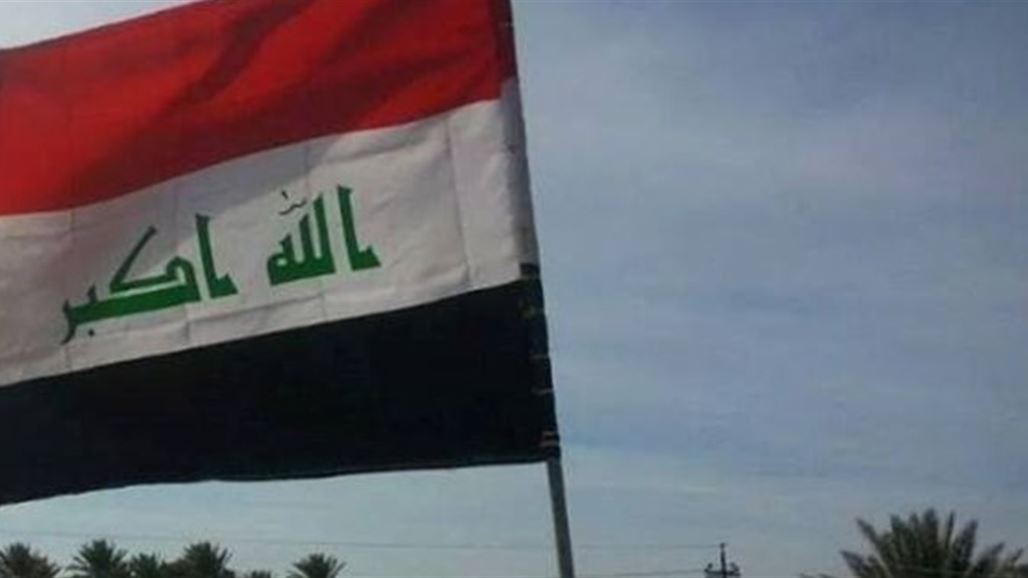 رفع العلم العراقي وسط الحويجة و"داعش" يستنفر عناصره