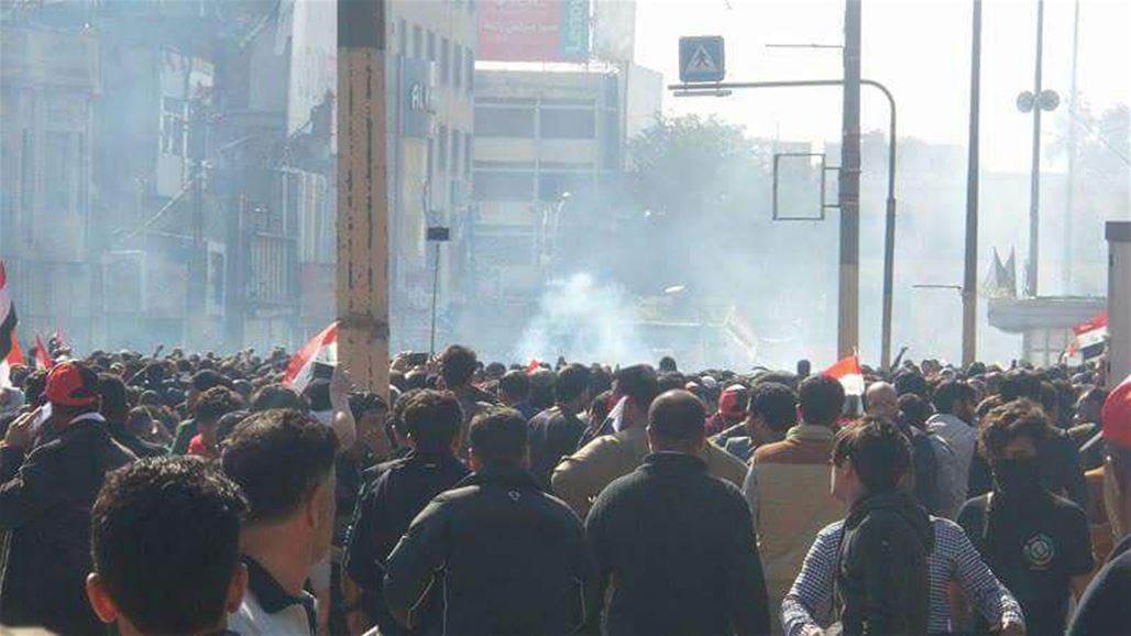اصابات خلال تفريق القوات الامنية للمتظاهرين في بغداد