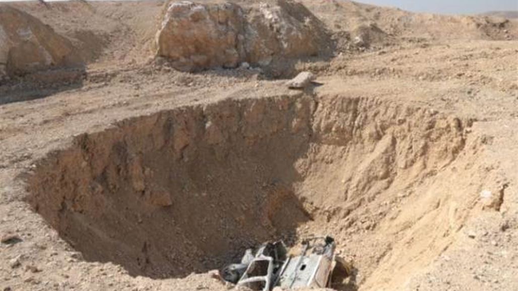 التليغراف تكشف عن مقبرة تضم قوافل أبادها "داعش" على طريق الموصل بغداد