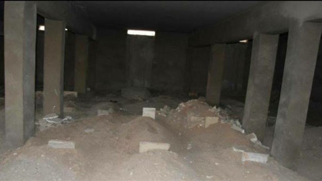 بالصور.. عمارة تجارية في الموصل تتحول الى مقبرة لعناصر "داعش"