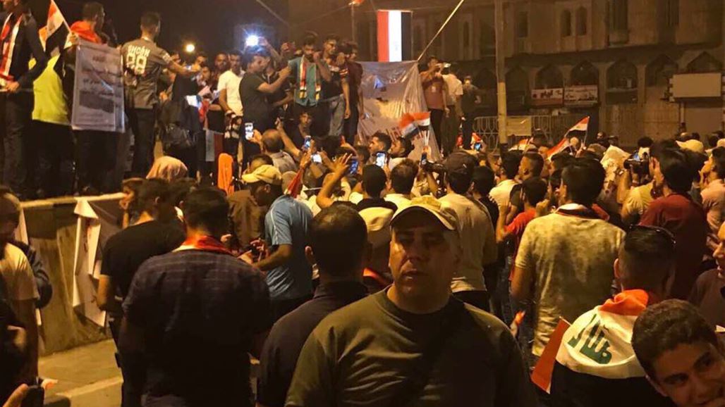 القوات الامنية تعيد فتح ساحة التحرير وسط بغداد