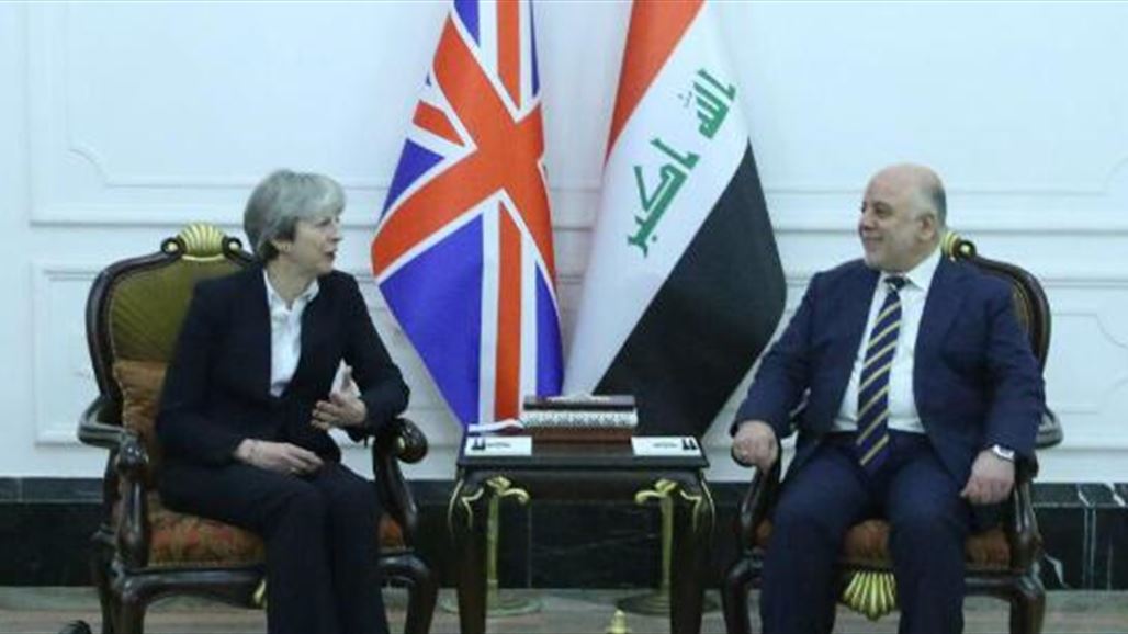ماي تبلغ العبادي بدعم بريطانيا لوحدة العراق وتدعو كردستان إلى تشجيع الحوار