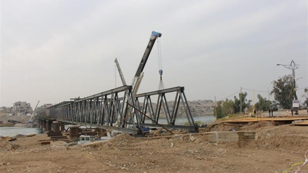 بالصور.. انجاز 75% من مشروع اعادة اعمار جسر الموصل الحديدي القديم