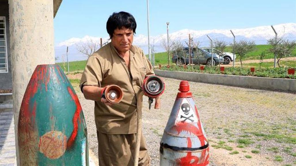 Moving with artificial feet .. Iraqi removes hundreds of thousands of mines NB-265255-636897401678086987