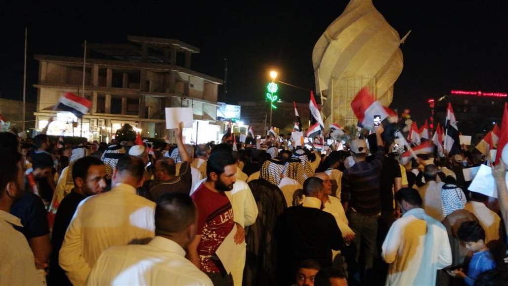 Hundreds demonstrate in the center of Karbala and demand the removal of the regional war on Iraq Doc-P-305468-636943192462046068