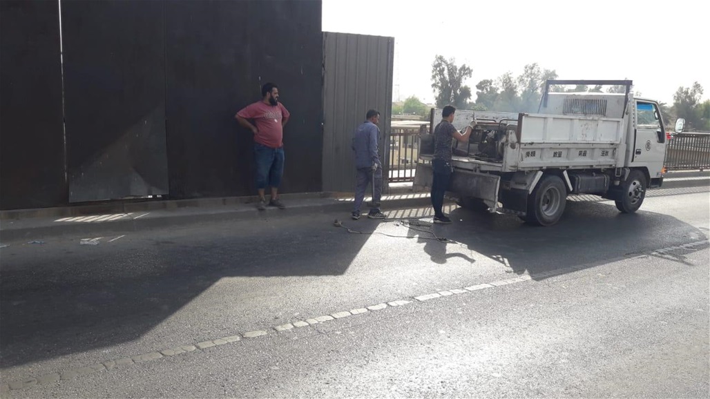 رفع السياج الأمني عن مجسر في منطقة القادسية ببغداد