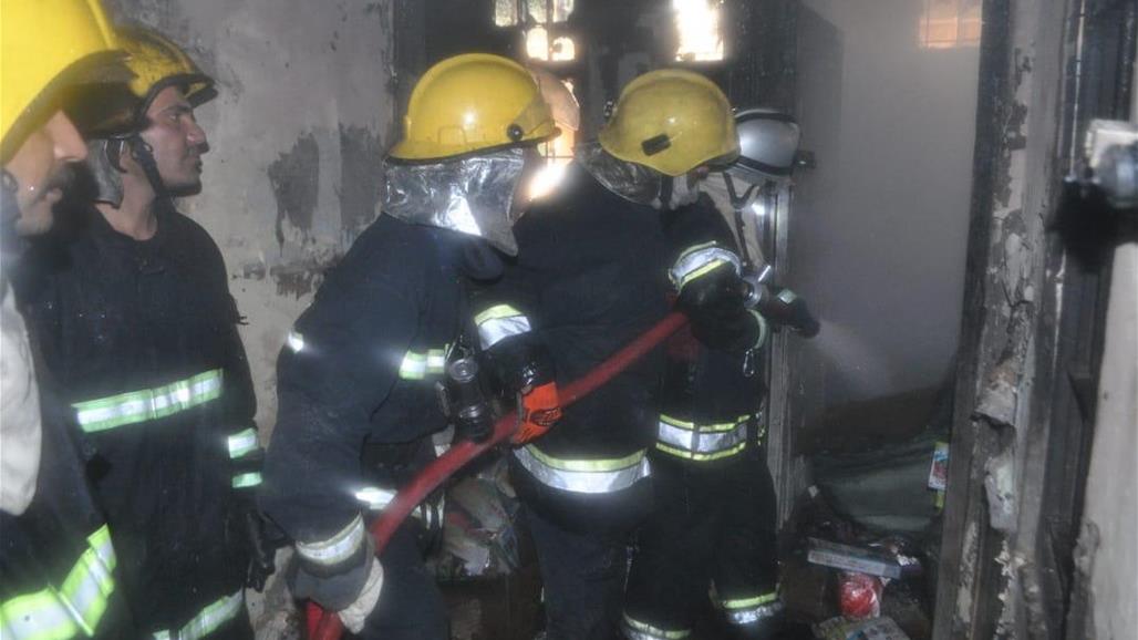  بالصور.. اخماد حريق داخل مخازن للاقمشة في شارع الرشيد ببغداد