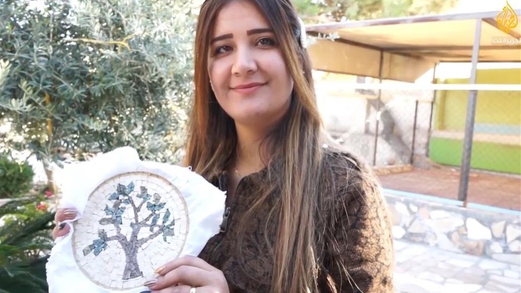  بالصور.. لاجئون عراقيون يصنعون عالماً من الفسيفساء احتفالاً بعيد الميلاد