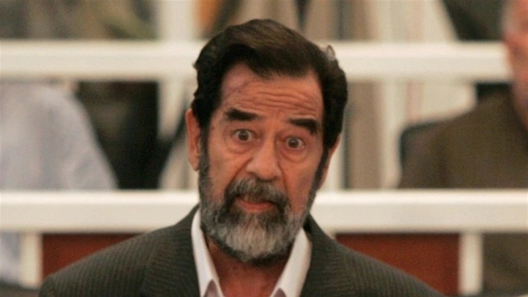 التحقيق مع ناشط رسم صدام حسين على جدار منزله "صورة"