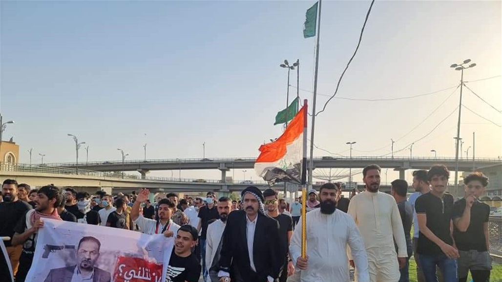 "من قتلني".. مسيرة تطالب بكشف قتلة الوزني في النجف (صور)