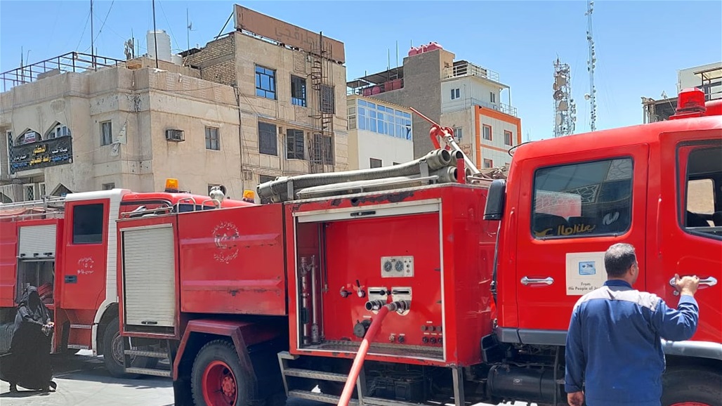 بالصور.. اخماد حريق في سوق وسط كربلاء