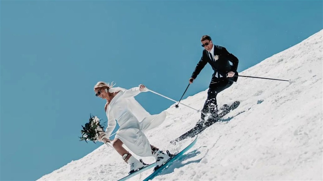 بالصور: عروس تتزحلق على الثلج في زفاف غير تقليدي!