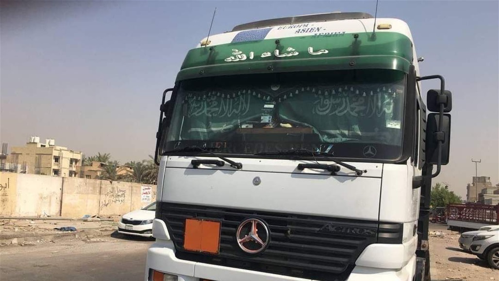 ضبط &quot;تريلة&quot; بداخلها أعلام سعودية وصور صدام حسين شرقي بغداد