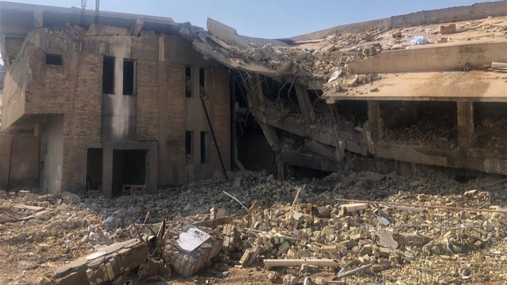 انهيار بناية مصرف الرافدين سابقا في كربلاء (صور) 