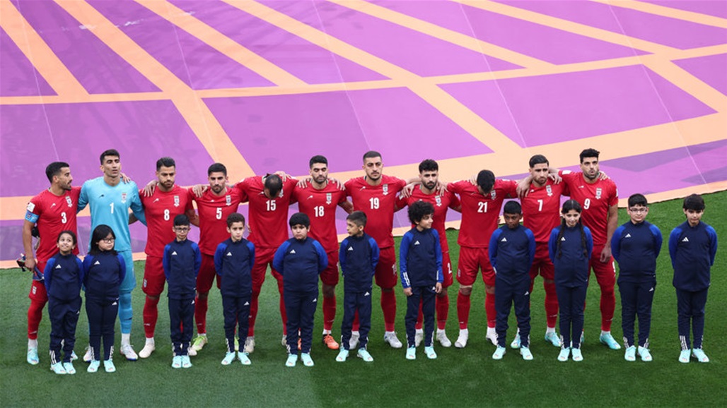 Iranian players refrain from singing their country's national anthem during the World Cup