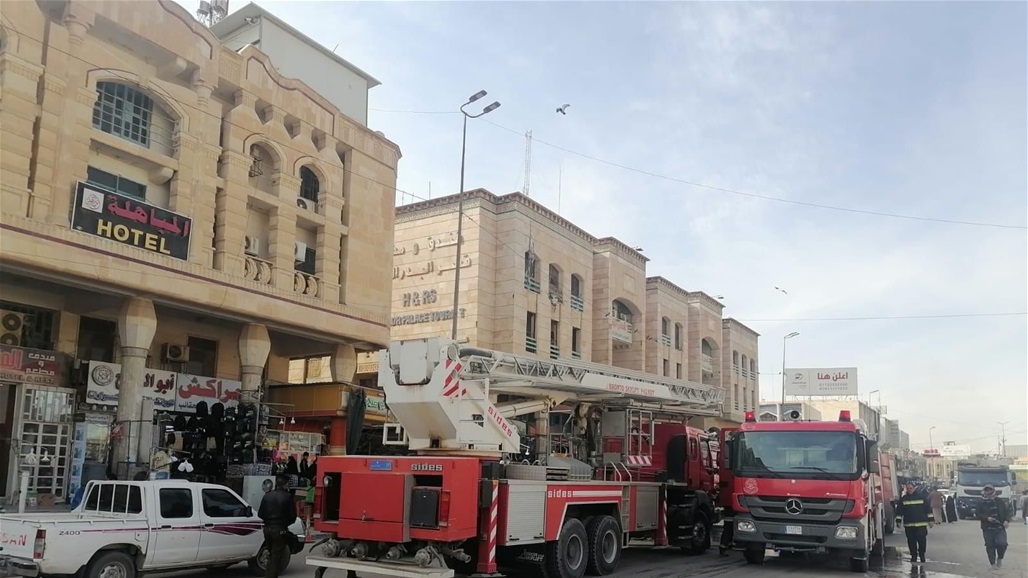 الدفاع المدني تخمد حريقاً اندلع بفندق في النجف (صور)