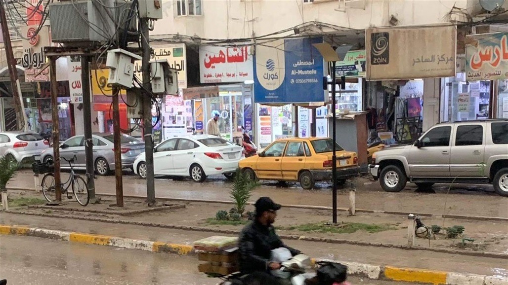 أمطار غزيرة في كربلاء والديوانية (صور)