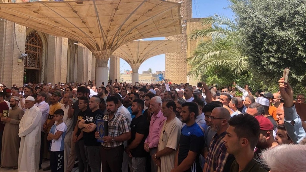 تظاهرة تندد بحرق المصحف شمالي بغداد (صور)