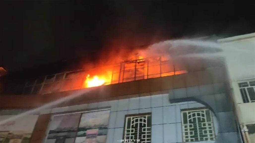 بغداد.. إخماد حريق اندلع بمعمل للصناعات الغذائية في منطقة جميلة (صور)