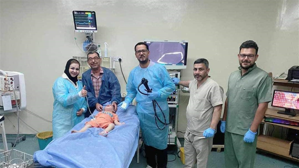 استخراج &quot;تراجي إذن&quot; من معدة طفل في بابل (صور)