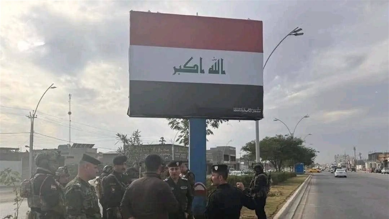 بعد حرقه.. القوات الأمنية تعيد نصب العلم العراقي في كركوك