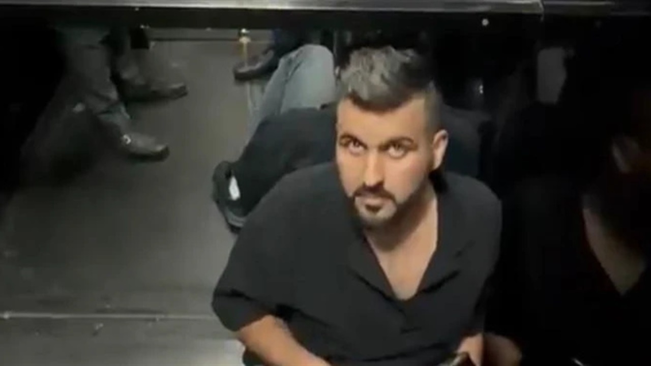 Iraq broadcasts footage of suspect wanted over military insults captured in Turk