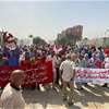 بيافطات مثقلة بالمطالب.. انطلاق مسيرة لتظاهرة عمالية في بغداد (صور)