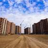 ما شكل البنايات السكنية بمشروع مدينة الصدر الجديدة؟
