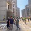 الدفاع المدني يُنقذ ثلاثة عمال جراء انهيار سكلة بناء في بغداد (صور)