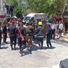 الدفاع المدني ينقذ 25 شخصا ويخمد حريقا في بناية وسط بغداد (صور)