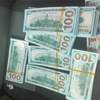 ضبط 600 ألف دولار مزوّرة في بغداد