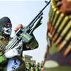 تقرير يكشف موقف واشنطن من فكرة تسليم سلاح الفصائل إلى الحشد