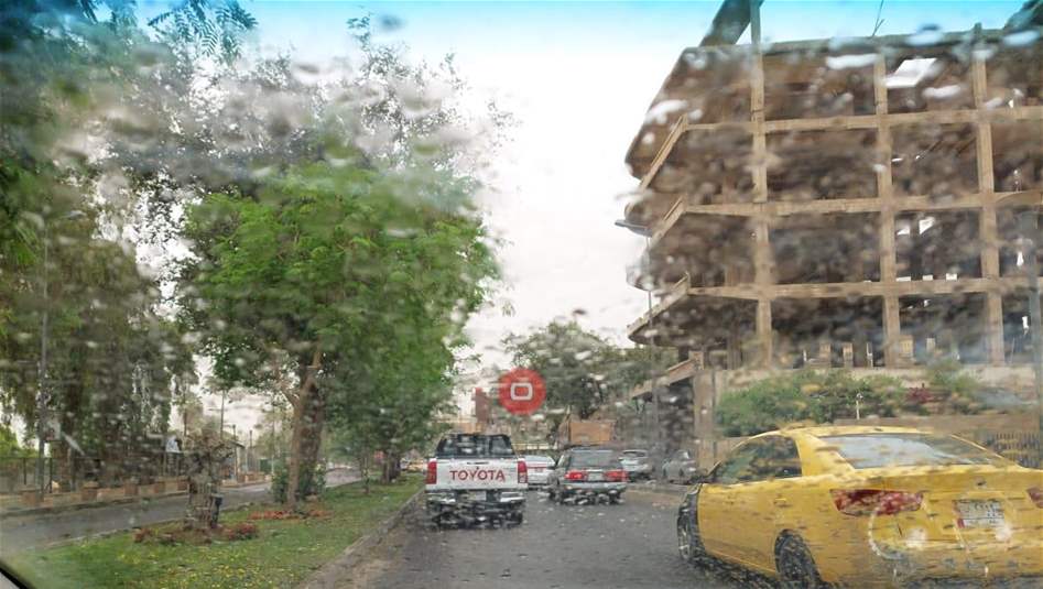 هطول أمطار خفيفة في العاصمة بغداد (صور)